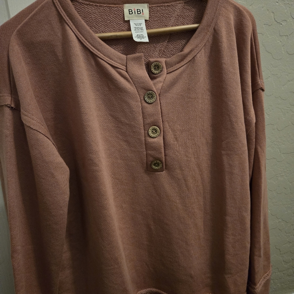 Button pull over